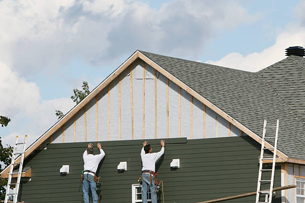 Professional Storm Damage Siding Repair technician working in Beverly, OH